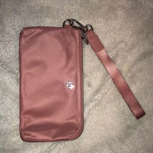 New without tags lululemon rosy pink wristlet in perfect condition
